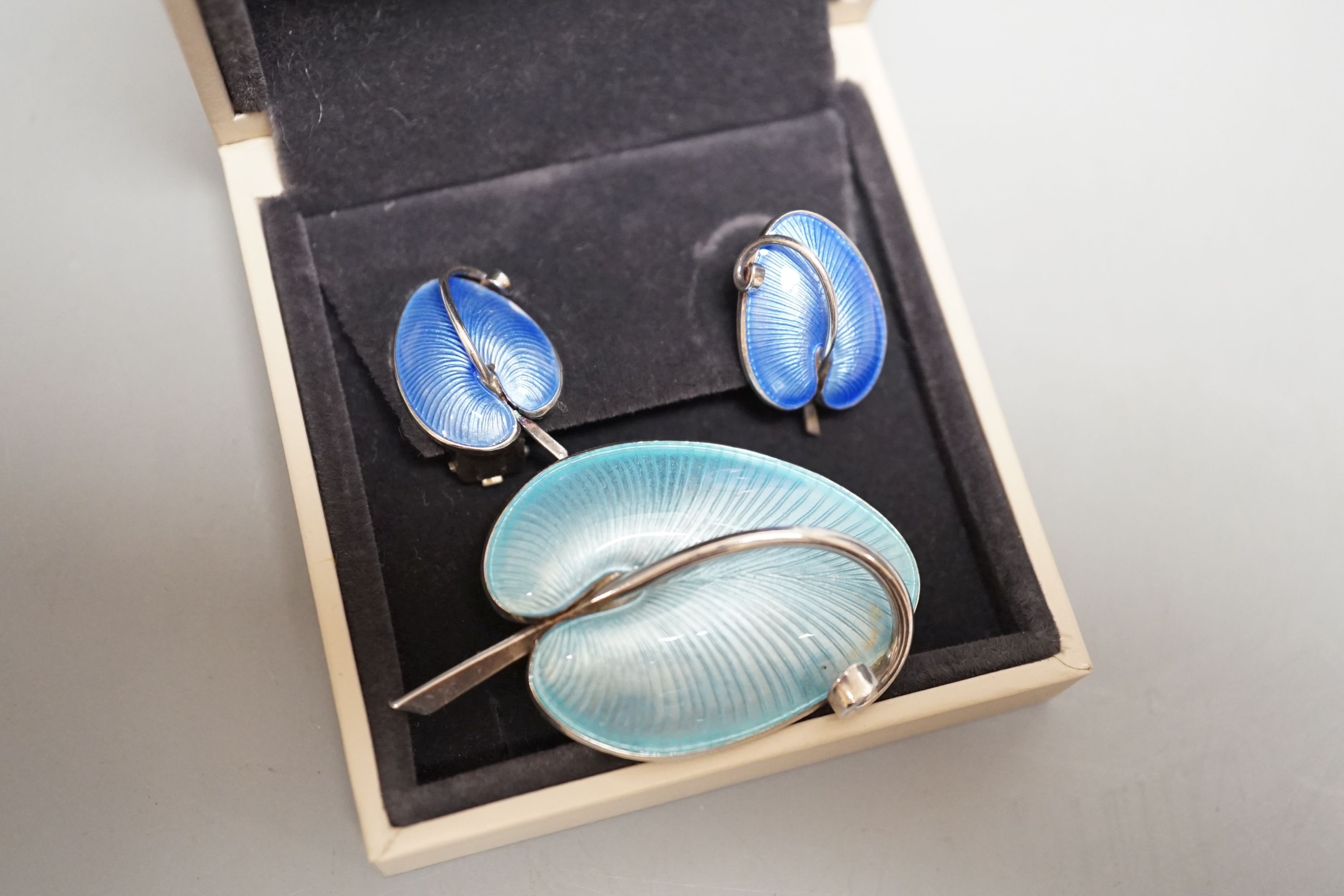 A pair of 20th century Danish sterling and enamel ear clips by Volmer Bahner & Co, 21mm and similar brooch, 47mm.